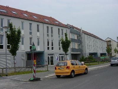 Mehrfamilienhaus und Geschäftsgebäude mit Tiefgarage in Darmstadt